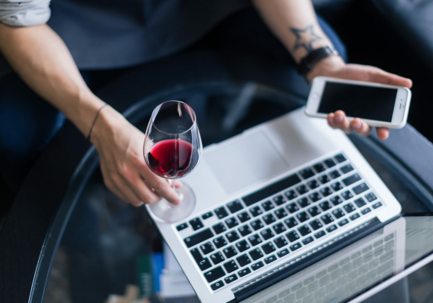 Portrait,Of,Senior,Sommelier,Sitting,In,Front,Of,Laptop,At